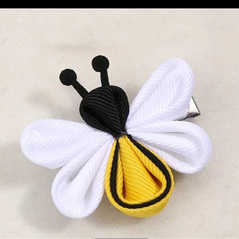 Cute little bee shaped hair clips.